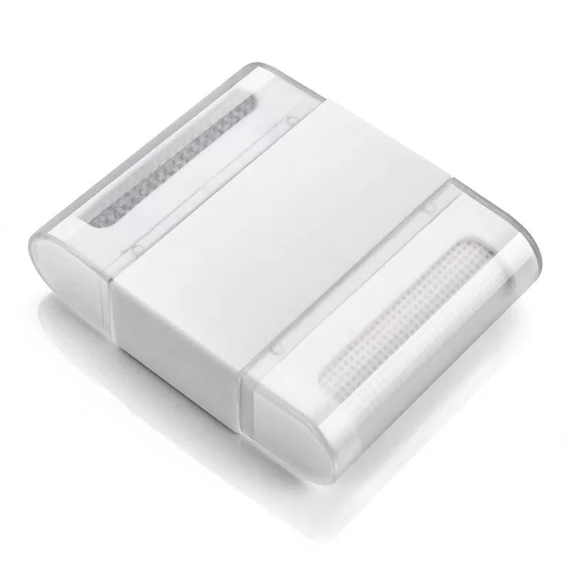Mini brosse anti-poils portable — vêtements et tissus