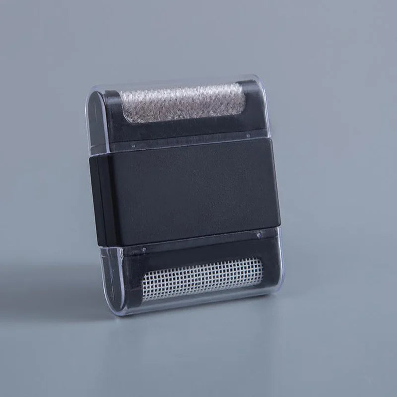 Mini brosse anti-poils portable — vêtements et tissus